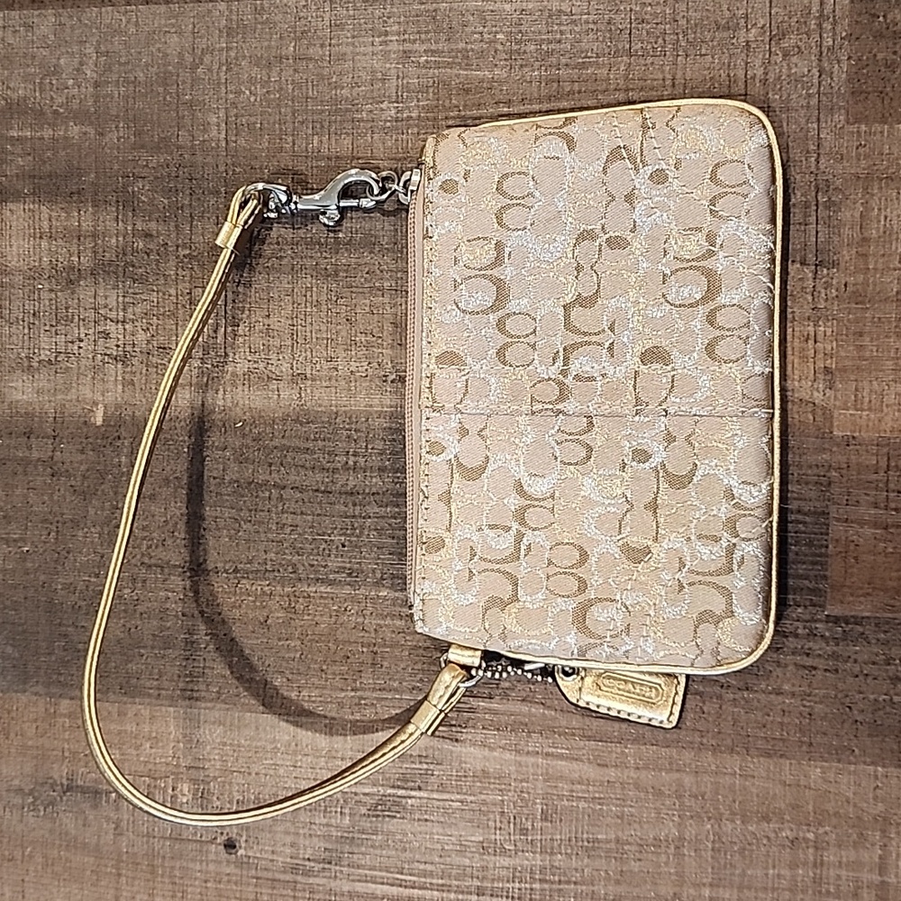 Small gold silver Coach wristlet